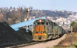 MGA, Monongahela Railway GP38s 2001- 2003 has a northbound loaded coal train at, Morgantown, West Virginia. March 21, 1986. 